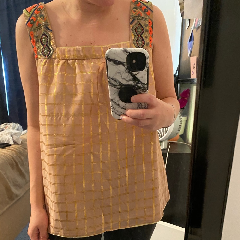 Statement top with hand beaded detail on shoulder